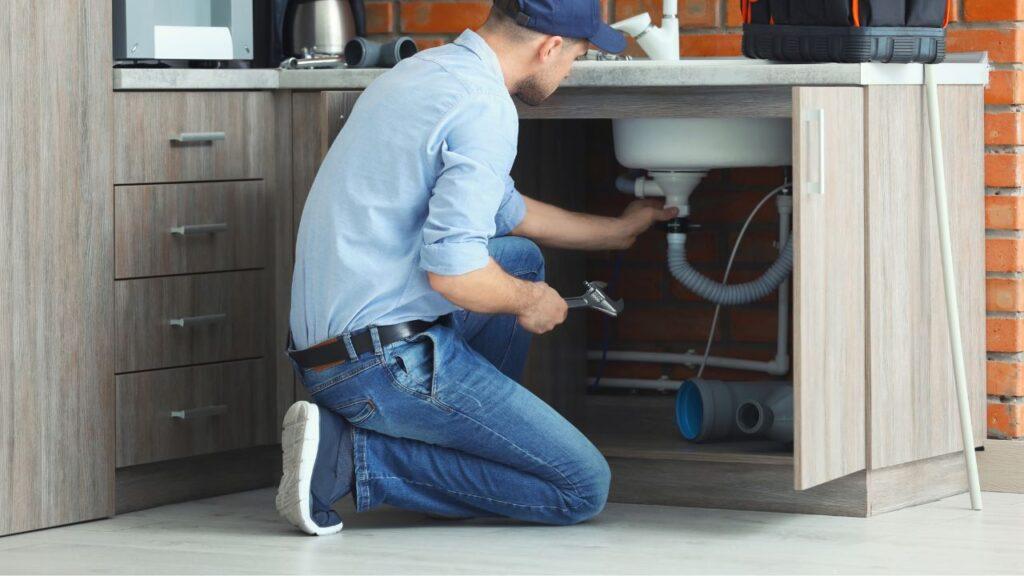 Fixing a plumbing leak in Vado